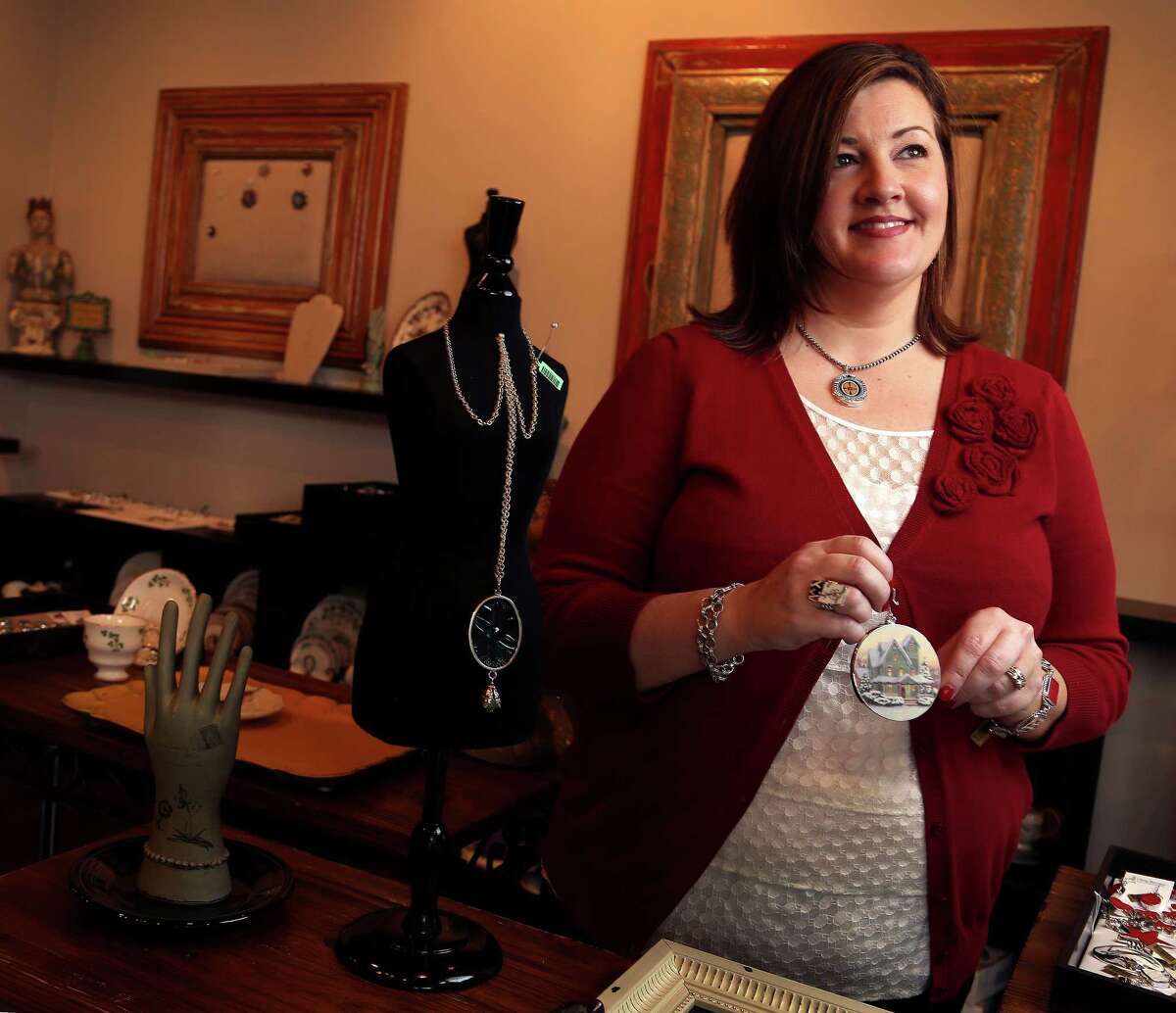 Christie Gunter, of China Baroque, who makes jewelry and other items such as this Christmas ornament, out of china pieces, Monday, Oct. 28, 2013, in Houston. She and her design team use old china pieces to make the custom jewelry collection and they will be showing at the upcoming Nutcracker Market. ( Karen Warren / Houston Chronicle )