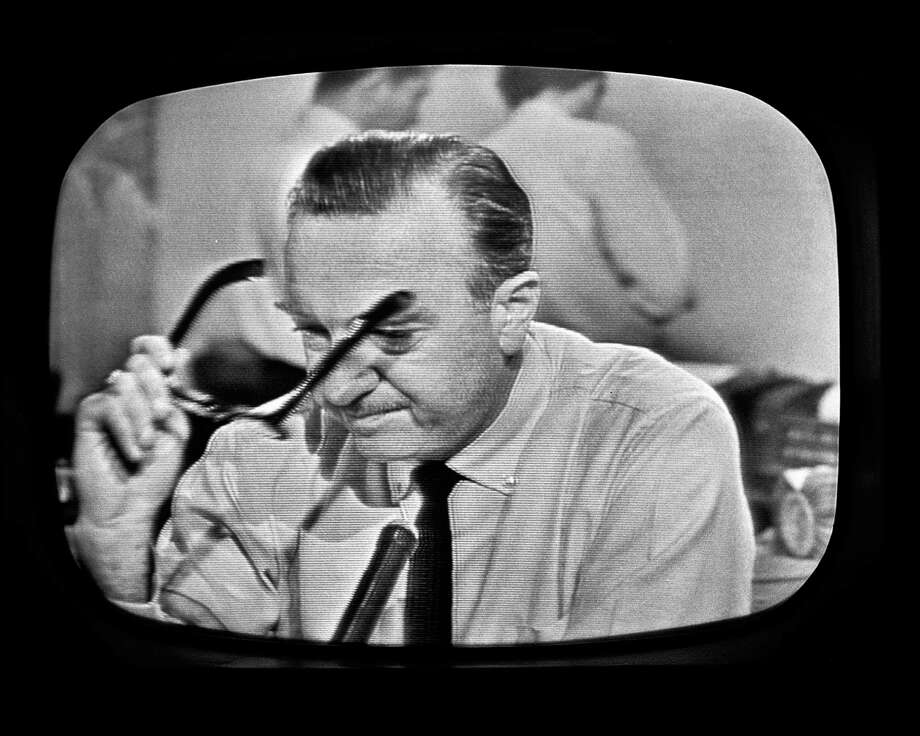 Television frame grab of American broadcast journalist and anchorman Walter Cronkite as he removes his glasses and prepares to announce the death of President John F. Kennedy, November 11, 1963. Photo: CBS Photo Archive, Contributor / 2005 CBS WORLDWIDE INC
