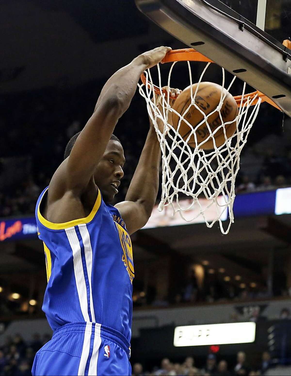 Golden State Warriors' Harrison Barnes slams in two points in the second half of an NBA basketball game against the Minnesota Timberwolves, Wednesday, Nov. 6, 2013, in Minneapolis. The Warriors won 106-93. (AP Photo/Jim Mone)