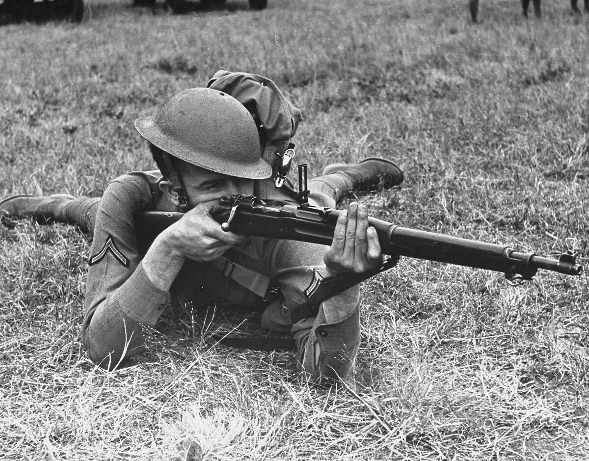 A view of a soldier using a Springfield rifle, 1938.