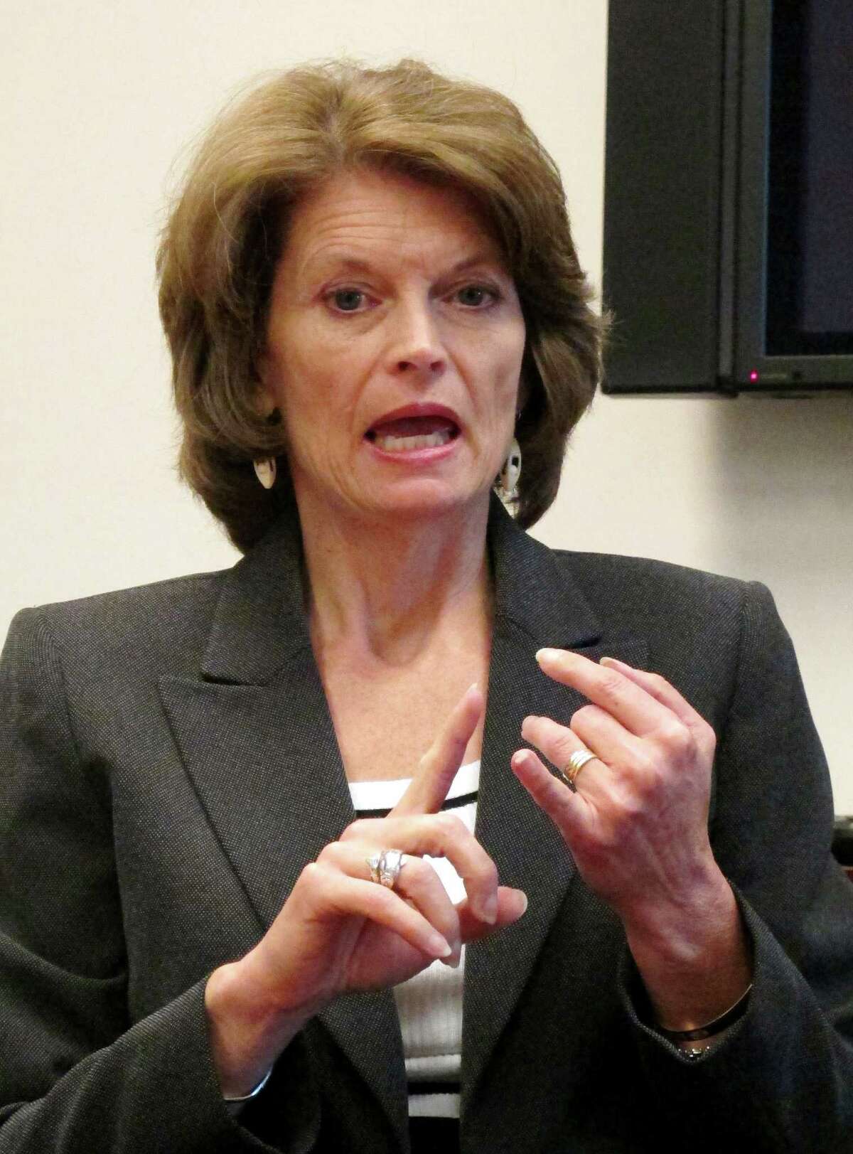 FILE - In this April 19, 2011 file photo, Sen. Lisa Murkowski, R-Alaska gestures during an interview in Anchorage, Alaska. Is the 2012 election shaping up to be all about women? Democrats are accusing the GOP of a âwar against womenâ after the Republicans reignited a national debate over cultural issues, including birth control. President Barack Obama says the Democrats have the best story to tell female voters. But Republicans _ including Ann Romney and Alaska Sen. Lisa Murkowski _ say their party will win by focusing on women's top issue: the economy. (AP Photo/Mark Thiessen, File)