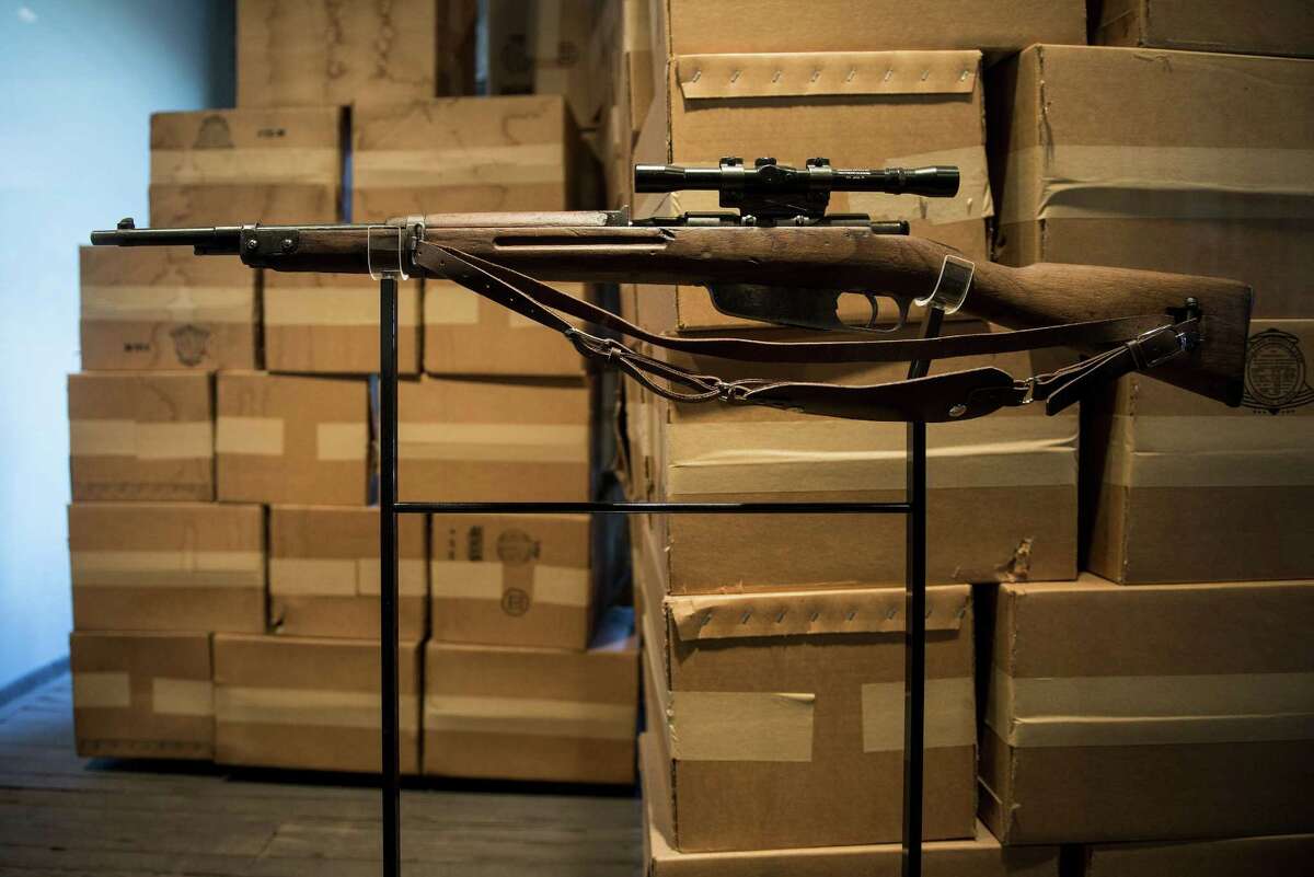 A Carcano Model 91/38 rifle is seen near where Lee Harvey Oswald ditched his 50 years earlier the Sixth Floor Museum formally the site of the Texas School Book Depository October 8, 2013 in Dallas, Texas.