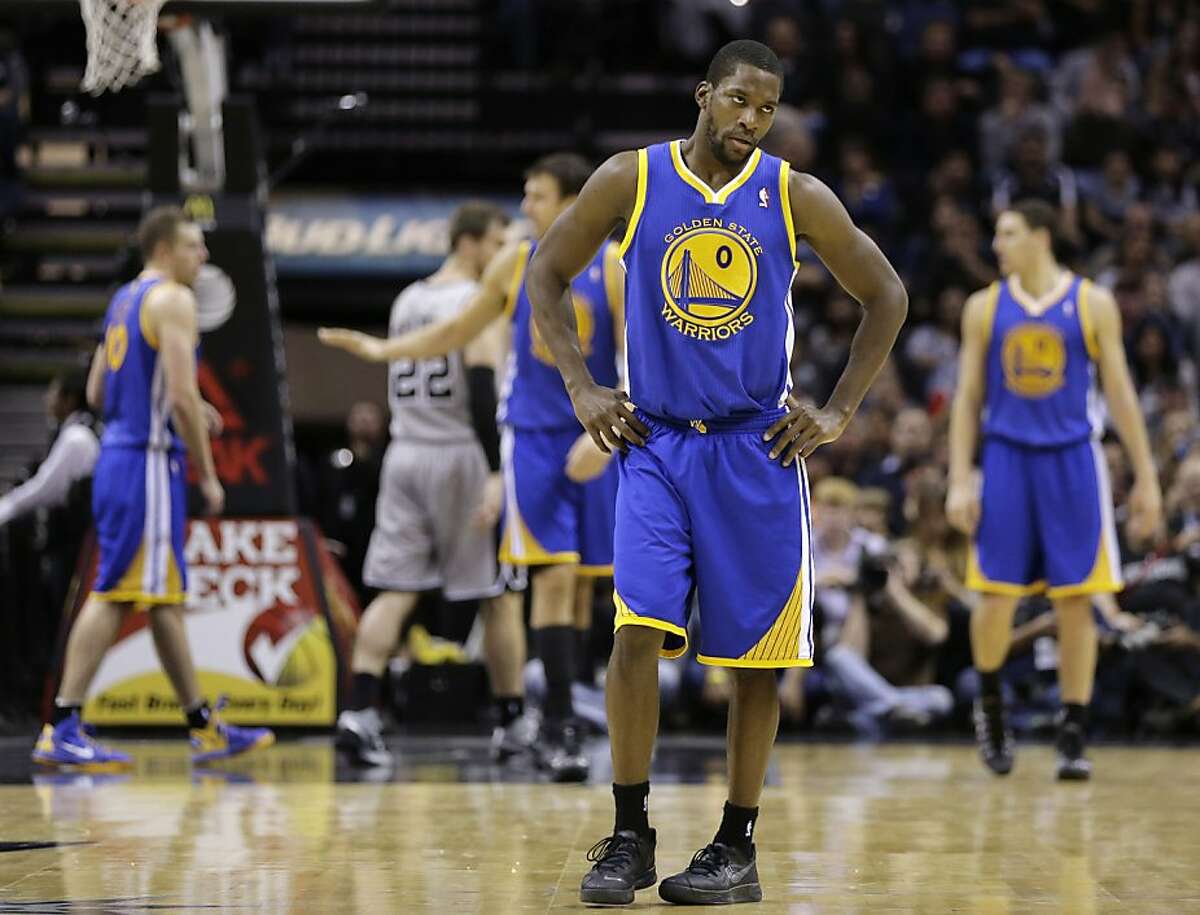 Golden State Warriors' Toney Douglas (0) reacts after the Warriors turned the ball over against the San Antonio Spurs during the second half of an NBA basketball game, Friday, Nov. 8, 2013, in San Antonio. San Antonio won 76-74. (AP Photo/Eric Gay)
