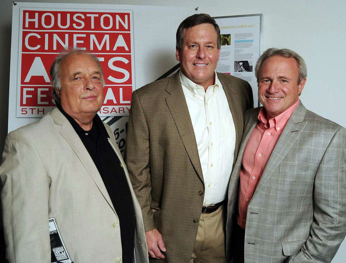 Director Al Reinert, left, attorney John Raley and Michael Morton arrive for the screening of Reinert's movie about Morton, wrongly convicted of killing his wife.