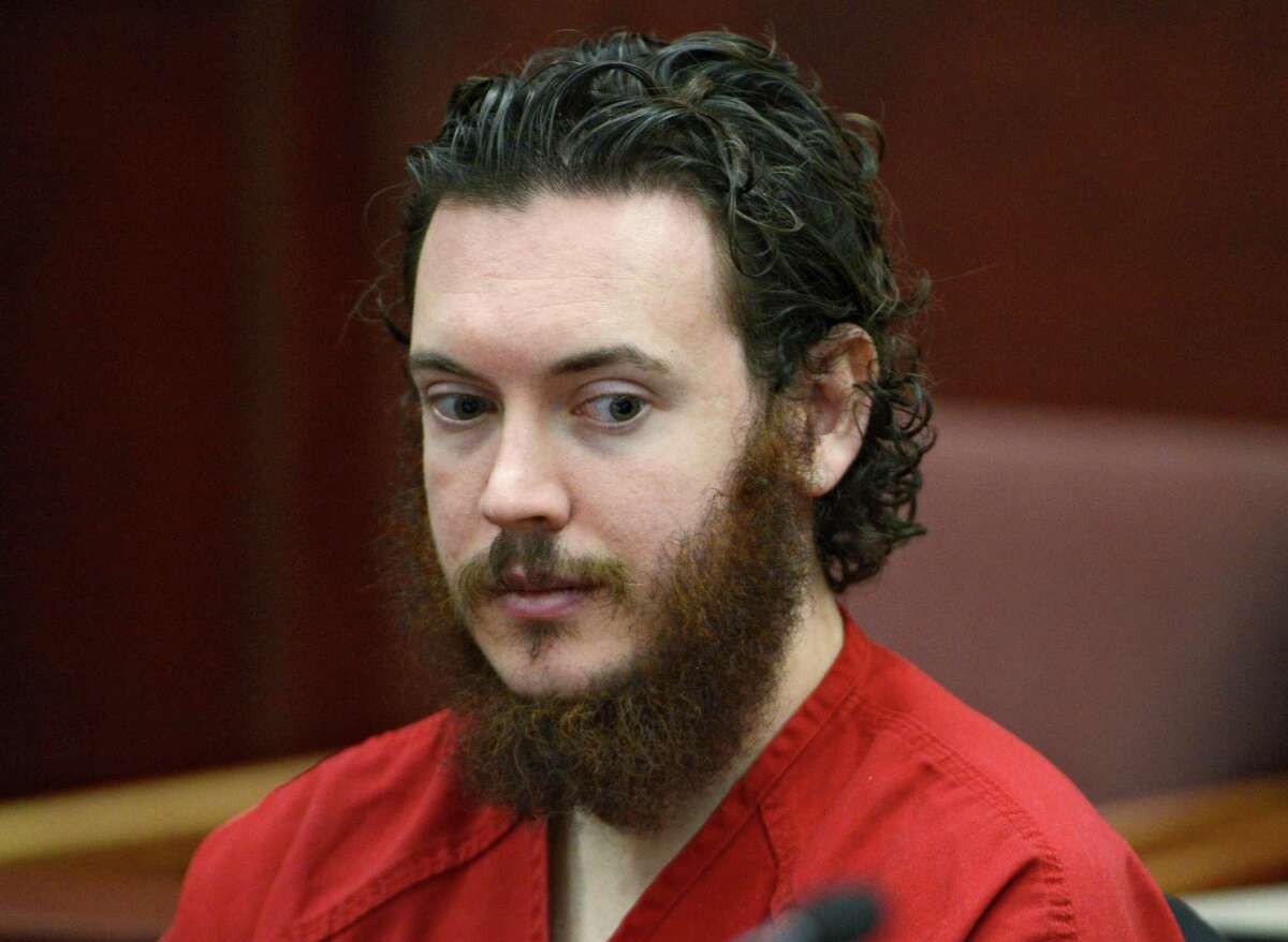 FILE -This June 4, 2013 file photo shows Aurora theater shooting suspect James Holmes in court in Centennial, Colo. Holmes is returning to court Monday Oct. 21, 2013 for another round of legal skirmishes over what evidence can be used against him when he goes on trial for the Colorado theater shootings. (AP Photo/The Denver Post, Andy Cross, Pool, File) ORG XMIT: CODEN601