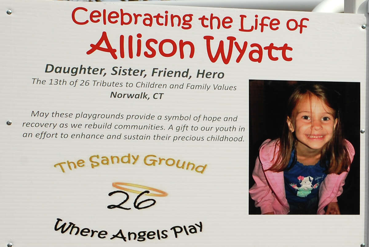 The sign at Oyster Shell Park on North Water Street, where a playground was dedicated Sunday in memory of Allison Wyatt, one of the 26 victims of the Sandy Hook Elementary School shooting last December.