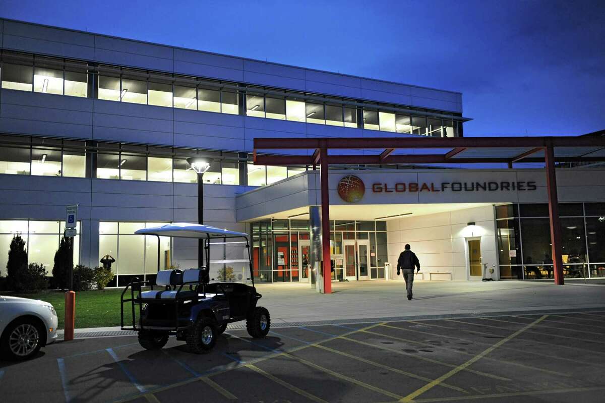 People enter the Fab 8 campus at GlobalFoundries for an open house event on Monday, Nov. 11, 2013 in Malta, N.Y. (Lori Van Buren / Times Union)