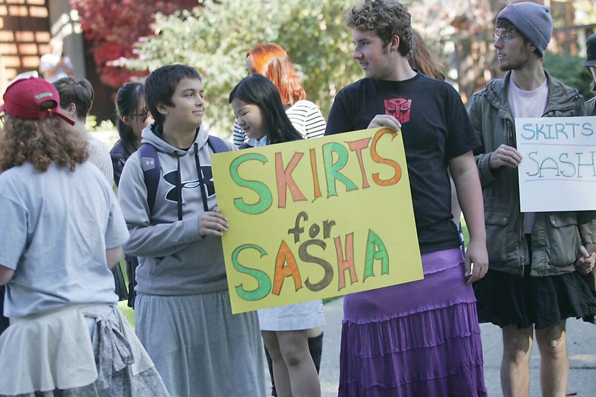 Students at Maybeck High School in Berkeley wear skirts on Friday Nov. 8, 2013 to support 18-year-old classmate Luke "Sasha" Fleischman, who was allegedly set on fire by 16-year-old Richard Thomas, who has been charged as an adult, while the two were riding an AC Transit bus in Oakland Monday night. Investigators have said Thomas told them he set Fleischman on fire because he is homophobic. Fleischman was wearing a skirt at the time.