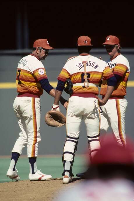 Astros catcher Cliff Johnson (middle) was an Astrodome fan favorite on "Foamer Nights" when he would make sure his at-bat started on an even minute, giving himself a chance to earn free beers for the home crowd. Photo: Diamond Images, Diamond Images/Getty Images