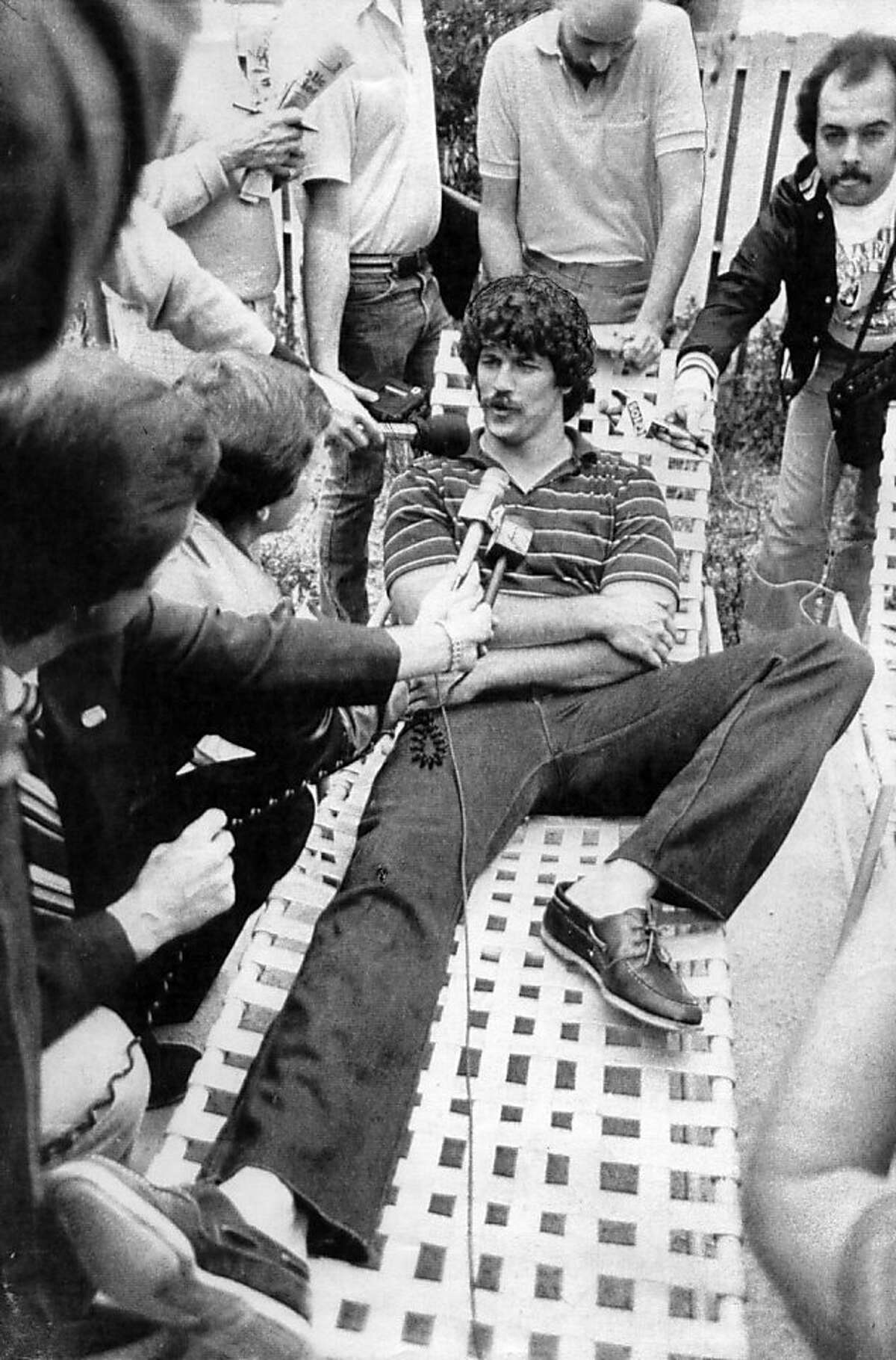 1/16/84 Tampa: Los Angles Raiders tight and Todd Christianon relaxes on a lounger at the team hotel surrounded by the media, Christianson caught twelve touchdown passes to lead the Raiders in TD receptions. Super BowlXVIII will pit the raiders against the NFC champion Washington Redskins. UPI