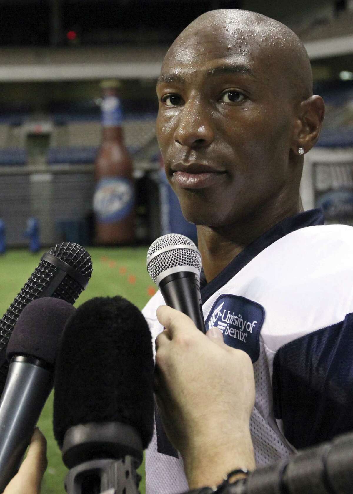 Former Dallas Cowboy Sam Hurd was sentenced to 15 years in prison for his role in a drug-pushing scheme while playing for the Chicago Bears,completing a steep downfall.