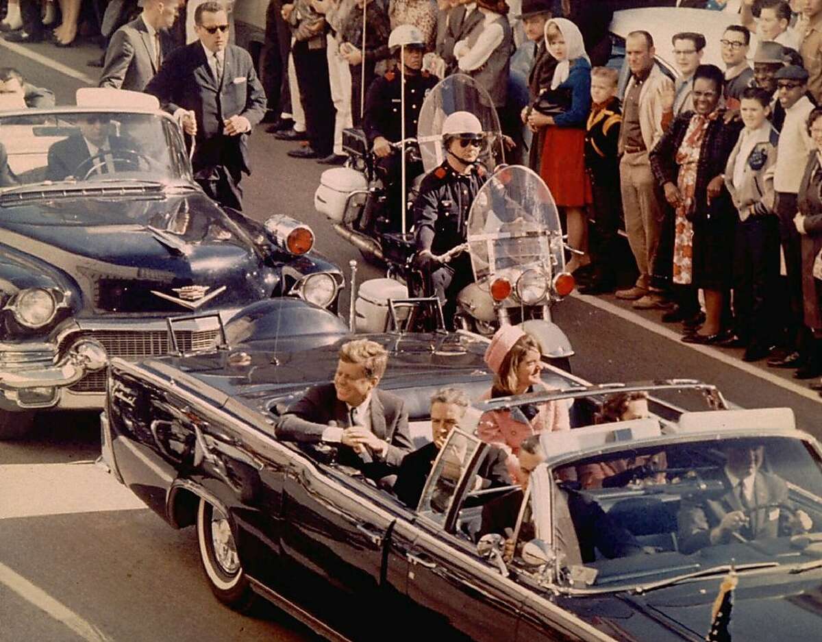 President and Mrs. John F. Kennedy, and Texas Governor John Connally ride through Dallas moments before Kennedy was assassinated, November 22, 1963. REUTERS