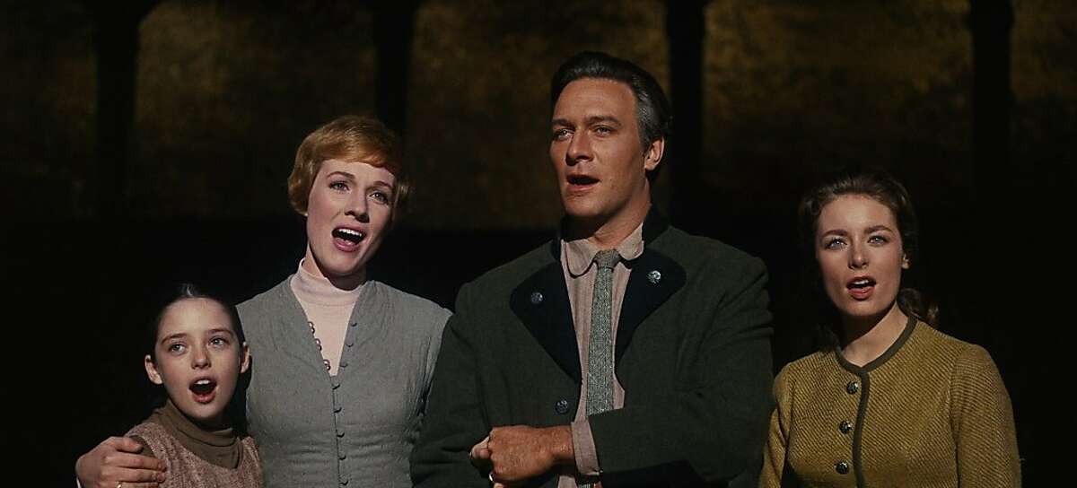 From left: Angela Cartwright, Julie Andrews, Christopher Plummer and Charmian Carr belt out a tune in the 1965 classic "The Sound of Music."