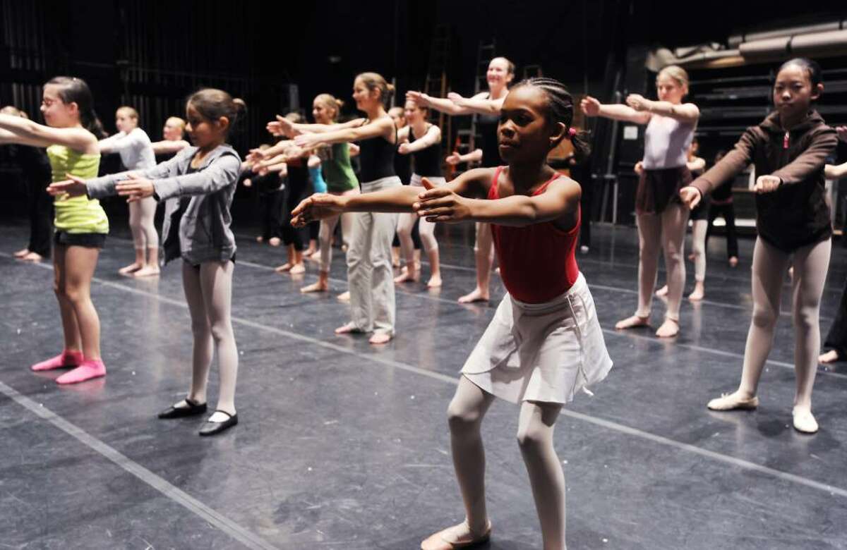 Dancers participate in a modern dance master class during DanceFest 2010 at the Palace Theater in Stamford, Conn. on Saturday, Jan. 23, 2010.
