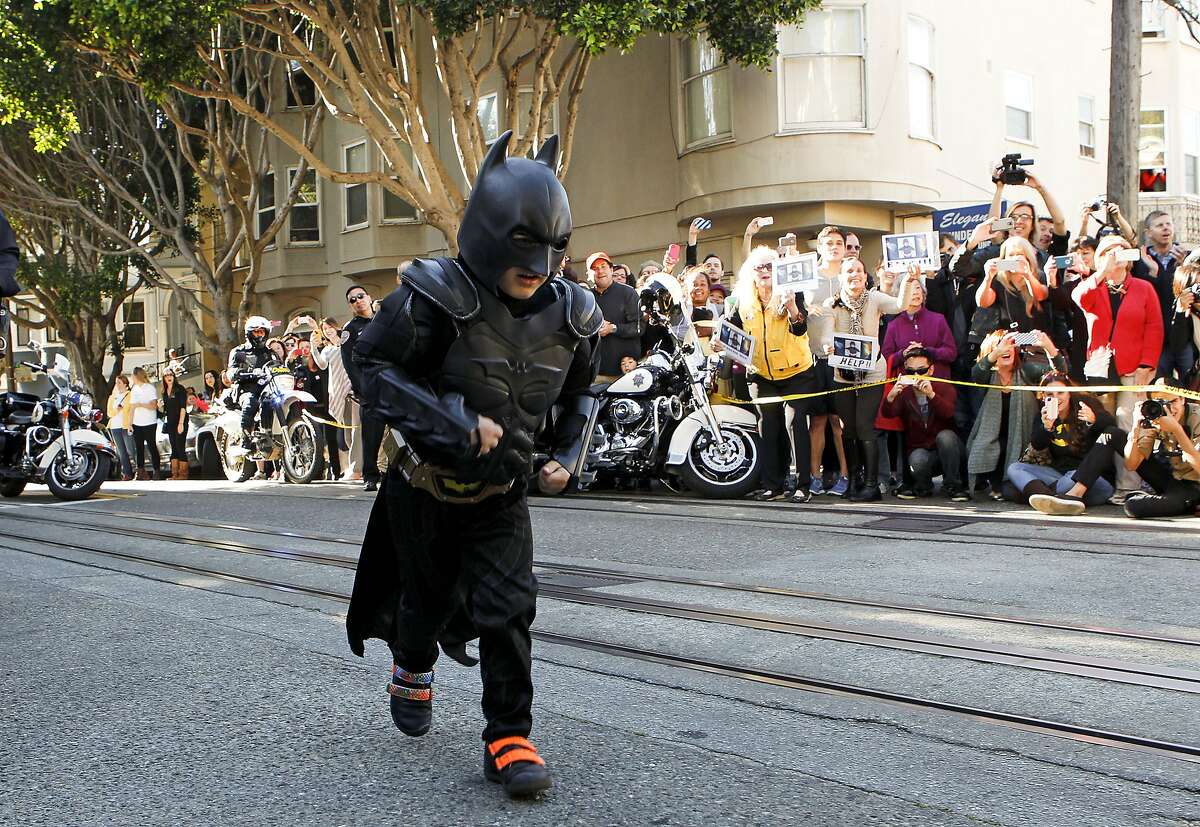 Batkid Thousands cheer on pintsize superhero