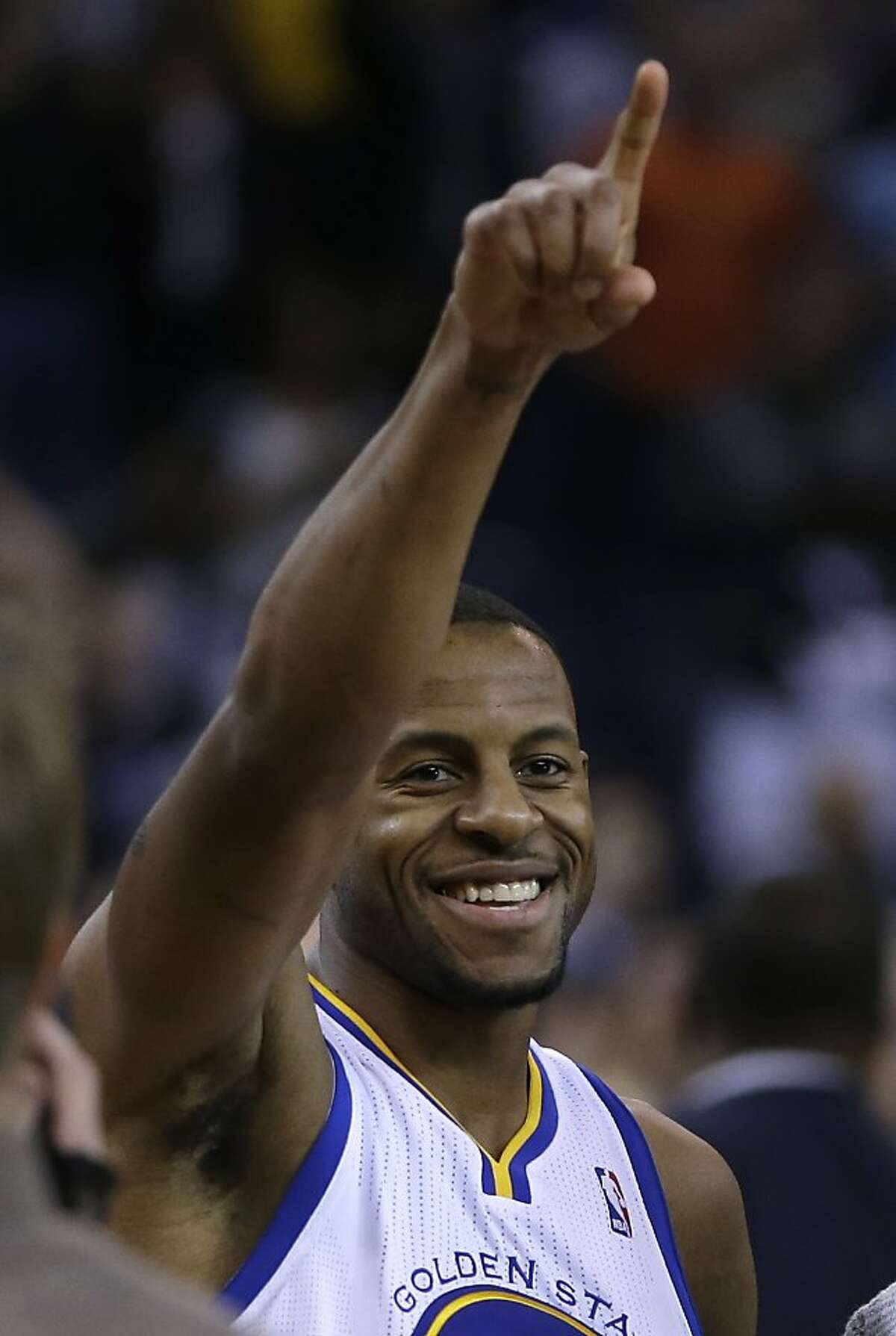 Golden State Warriors' Andre Iguodala celebrates after making the game-winning score over the Oklahoma City Thunder during the second half of an NBA basketball game Thursday, Nov. 14, 2013, in Oakland, Calif. (AP Photo/Ben Margot)