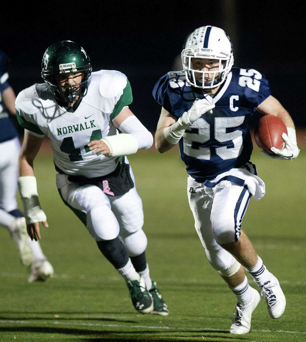 Staples football rolls past Norwalk