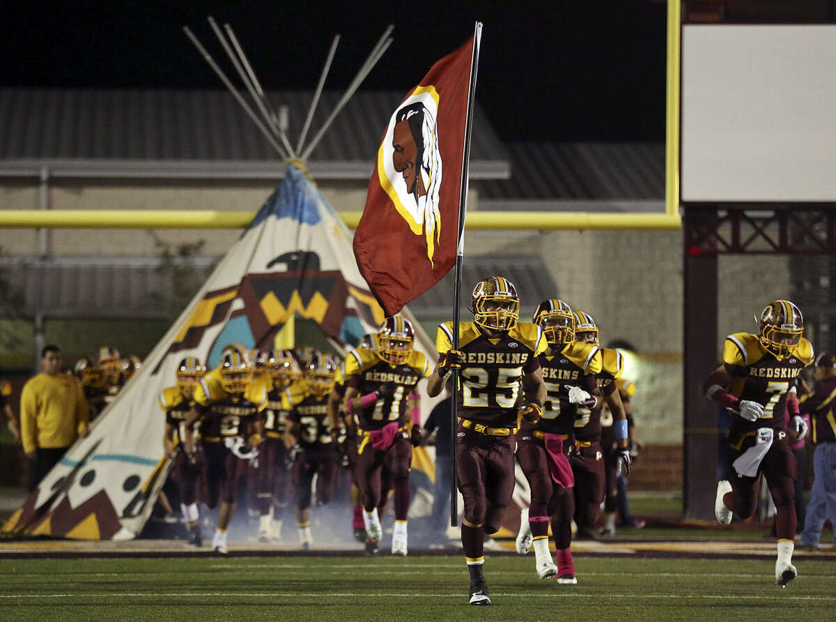 Members of the Donna Redskins football team take the field during a game in October. Their season ended Friday, with a 56-13 loss to Laredo United.
