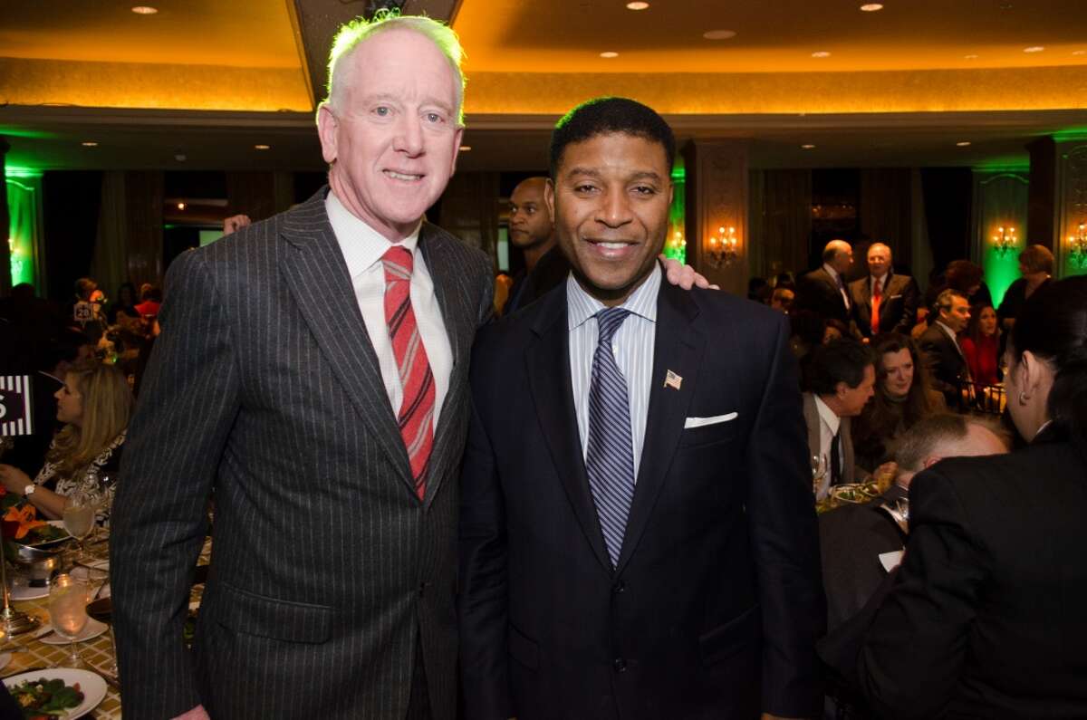 Archihe Manning with Emcee and CBS College Football Analyst Spencer Tillman during the Touchdown for Knowledge Arts Foundation Event on Wednesday, November 13, 2013 at Hotel Zaza in Houston, TX