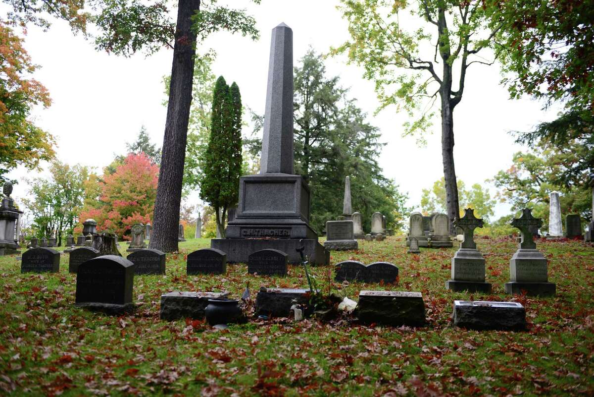 The grave of Edwin ?Ebby? Thacher, center, at Albany Rural Cemetery. Thacher is credited with inspiring Bill Wilson, a longtime drinking buddy, to start Alcoholics Anonymous. (Will Waldron/Times Union)