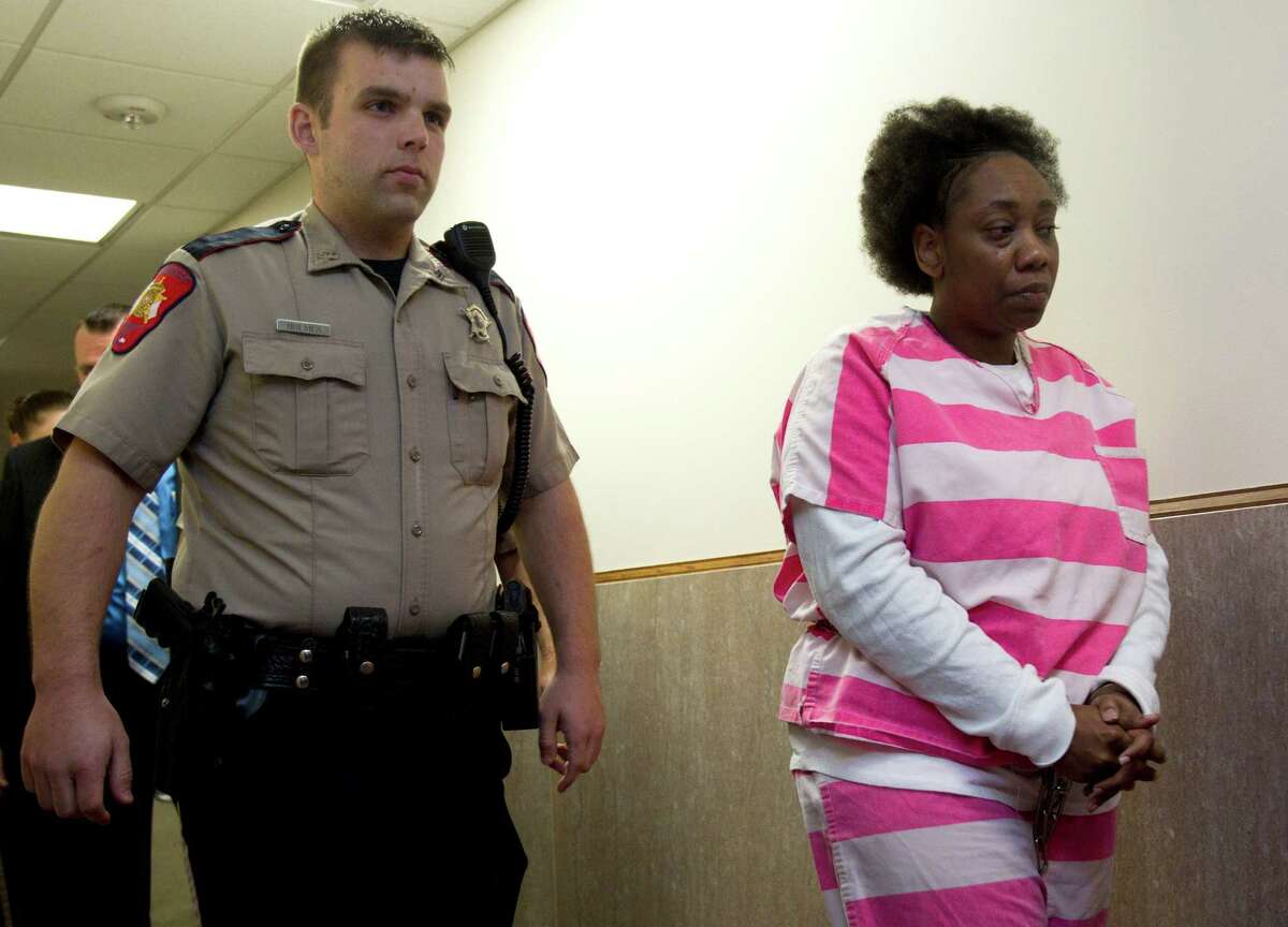 Nurse in child abduction, slaying agrees to life in prison