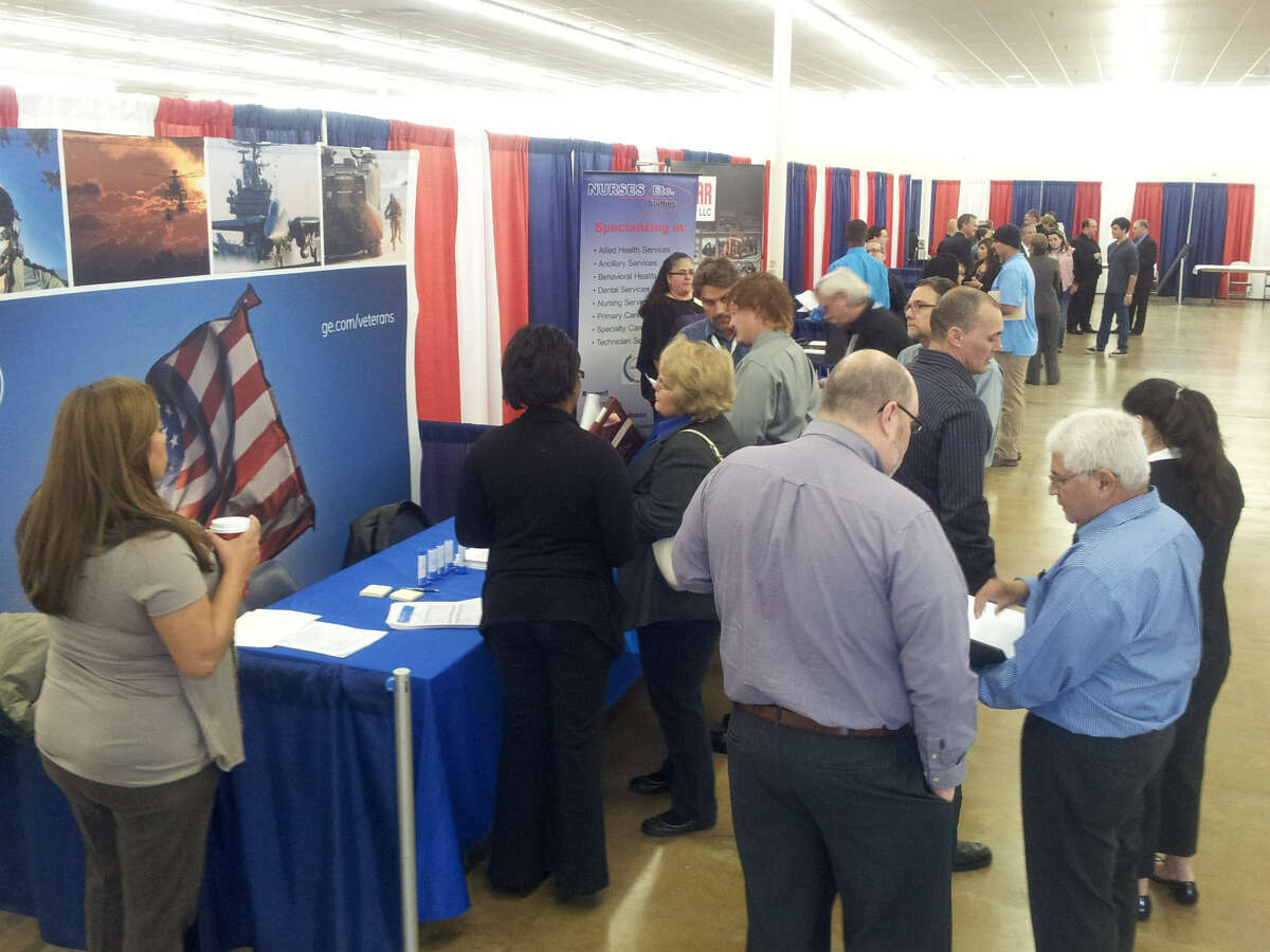 Job hunters packed the booths that made up Nov. 14's Red, White and You Job Fair at the Live Oak Civic Center. The fair brought veterans, servicemen and women and their spouses together with companies that are hiring.