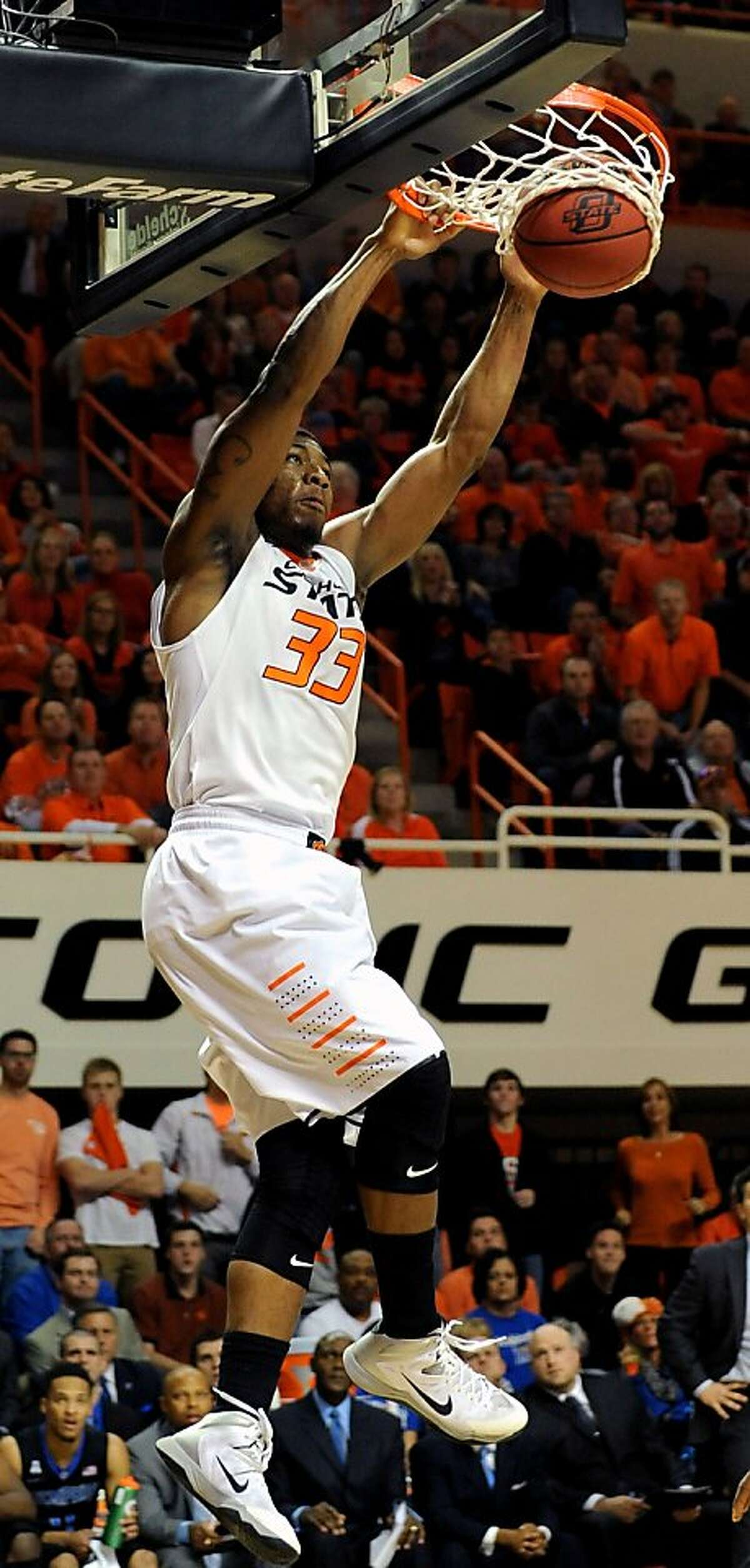 No. 7 Oklahoma State's Smart hits 39 in romp