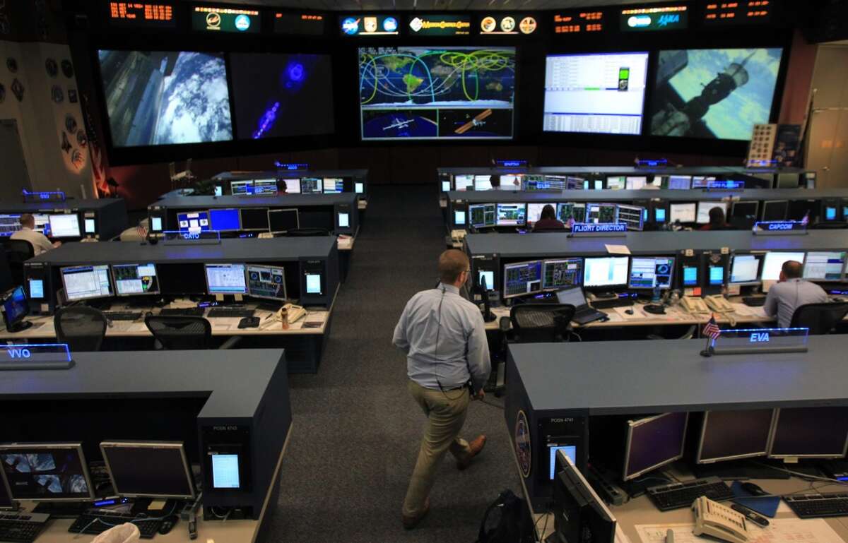 The flight path of International Space Station (ISS) can be seen on the screen as Flight Director Ed Van Cise supports ISS from Mission Control at Johnson Space Center on Tuesday, Nov. 19, 2013, in Houston. The International Space Station has been in operation for more than 15 years. ( Mayra Beltran / Houston Chronicle ) HoustonChronicle.com: Future up in the air as space station turns 15