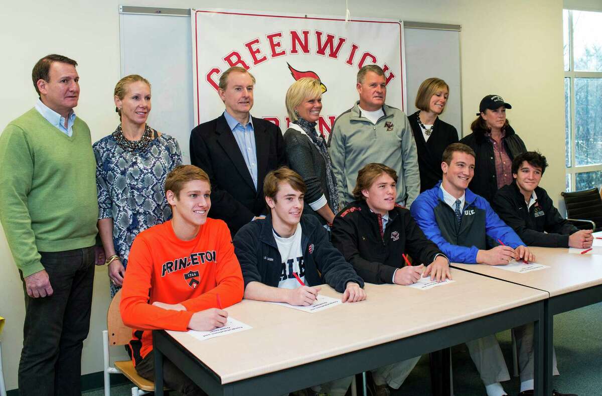 Eleven Greenwich high school athletes who have signed National letters of intent for colleges meet in the Media Center at Greenwich high school, Greenwich, CT on Wednesday, November, 20th, 2013. Left to right front row: Alexander Lewis (swimming/Princeton), Thomas Kingshott (squash/Yale), Kyle Dunster (baseball/Boston College), Jack Harrington (lacrosse/Duke), Harry McGuire (fencing/University of Pennsylvania).