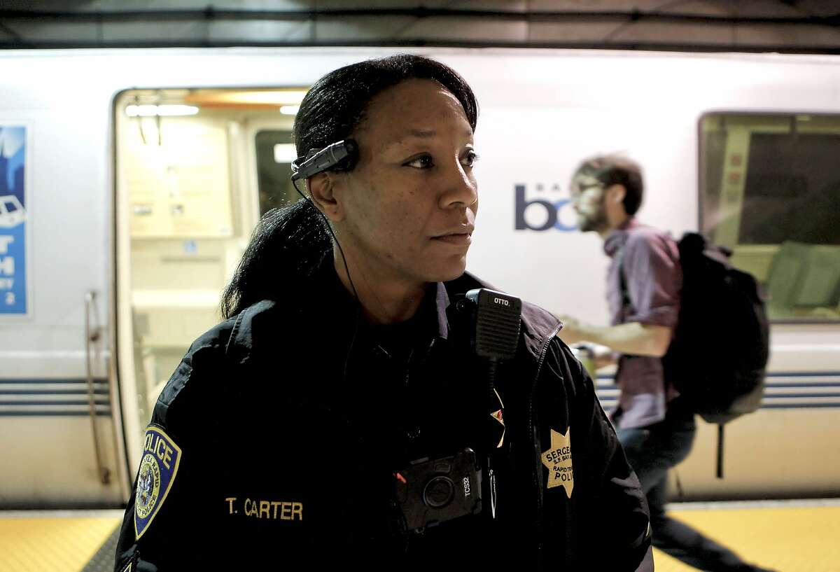 Sergeant Tanzanika Carter with the BART police force, wears the Axon Taser Flex video camera while on patrol in the Embarcadero BART station in San Francisco, Ca., on Wednesday Nov. 20, 2013. San Francisco Police officers will also start using the body mounted video cameras very soon.