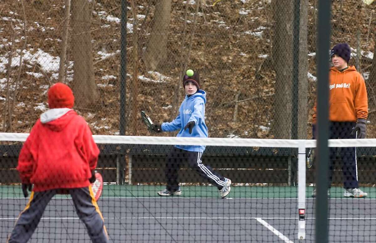 Tommy Kelley, 12 of Fairfield, eyes the ball as young players compete in the 2010 Junior National Platform Tennis Championships hosted by the New Canaan Field Club in New Canaan, Conn. on Saturday, Jan. 30, 2010.