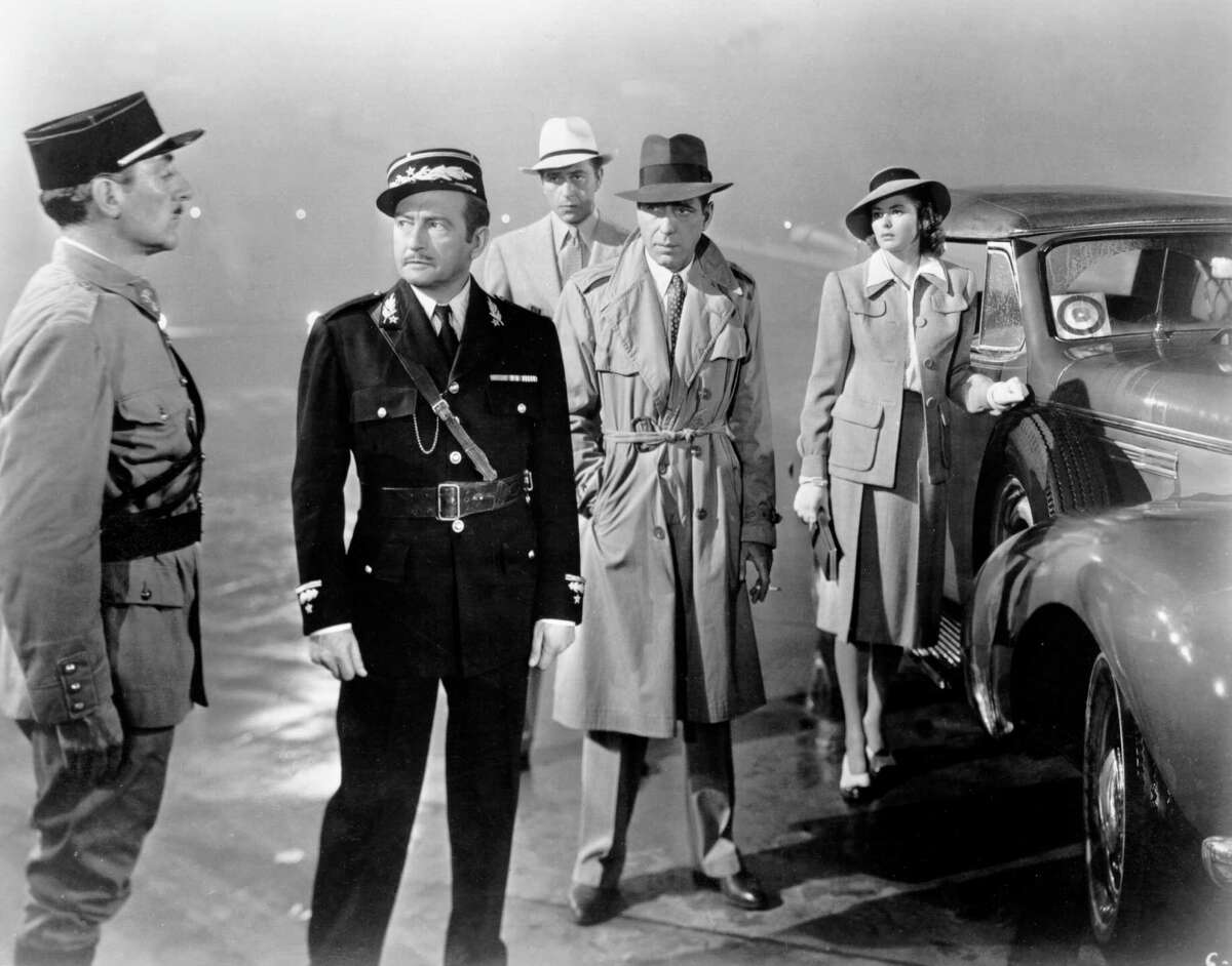 'Casablanca' sequel: Ilsa gets on the plane alright, but tells her husband everything and declares her love for Rick. Then hearing Rick’s warning that she would regret it if she stayed — "Maybe not today, maybe not tomorrow, but soon and for the rest of your life” — she is overcome with a jealous rage, takes over the plane and crashes it into the fog … magically missing Rick … the two set out cat and mouse fashion across the war torn world. Photo: A movie still of (L-R) Unidentified, Claude Rains, Paul Henreid, Humphrey Bogart and Ingrid Bergman on the set of the Warner Bros classic film 'Casablanca' in 1942 in Los Angeles, California.