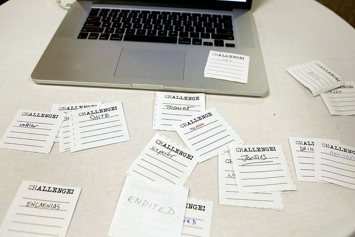 Word challenges are seen on slips of paper next to a computer for checking player word challenges at the 6th Annual California Open Scrabble Tournament at the Parc55 Wyndham Hotel in San Francisco, CA Saturday, November 23, 2013.