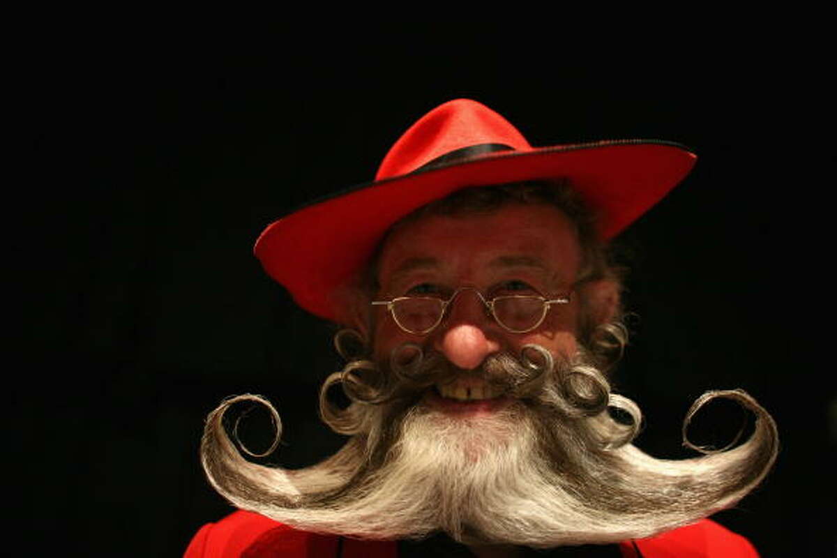 BRIGHTON, UNITED KINGDOM - SEPTEMBER 01: A competitor poses for a photograph whilst competing during the World Beard and Moustache Championships at the Brighton Centre on September 1, 2007 in Brighton, England. The World Beard and Moustache Championships is a biennial event participated by beard and moustache wearers from all over the world.