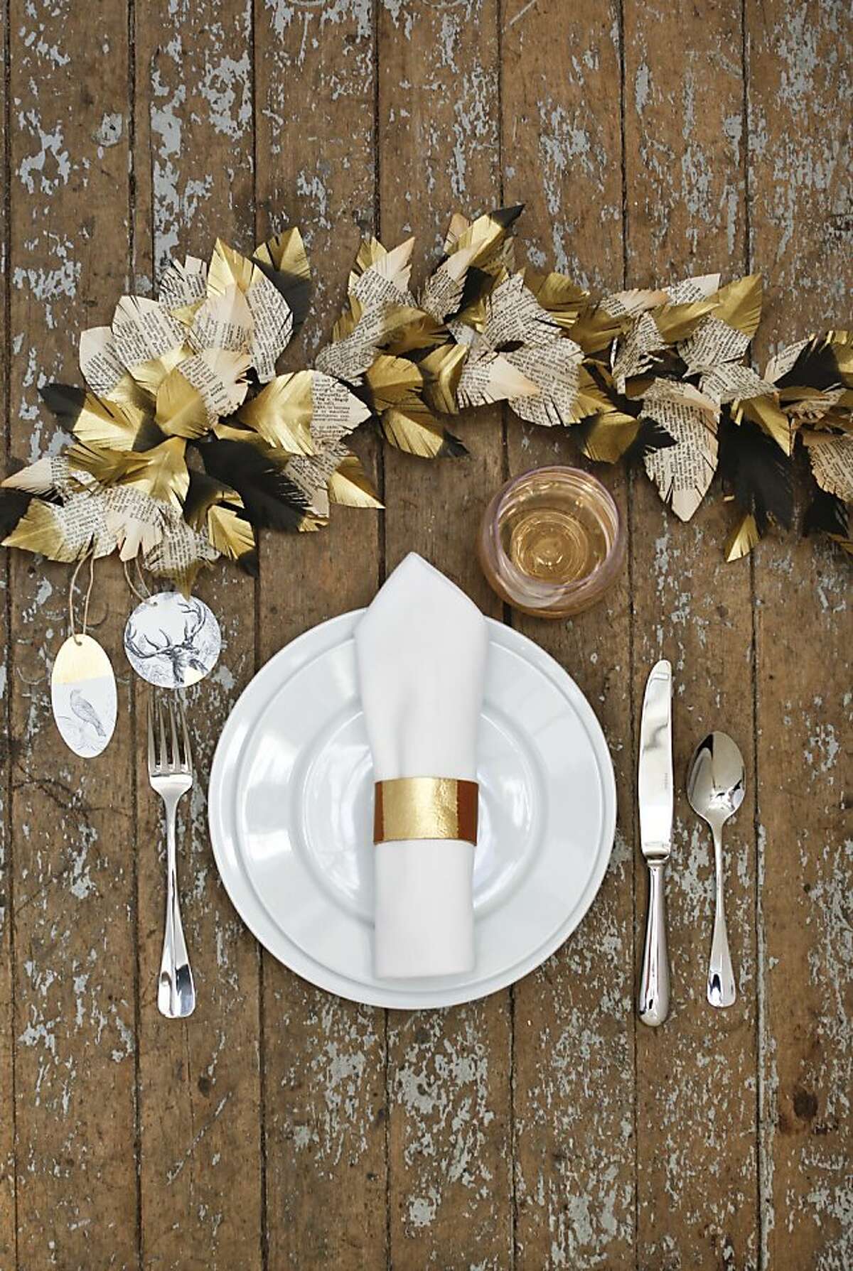 San Francisco Creativebug offers online videos on a variety of crafts. Instructor Courtney Cerruti shares three projects to add give your holiday home a DIY touch. To start, click through the photos for step-by-step instructions to create this elegant leaf and feather garland and leather napkin ring.