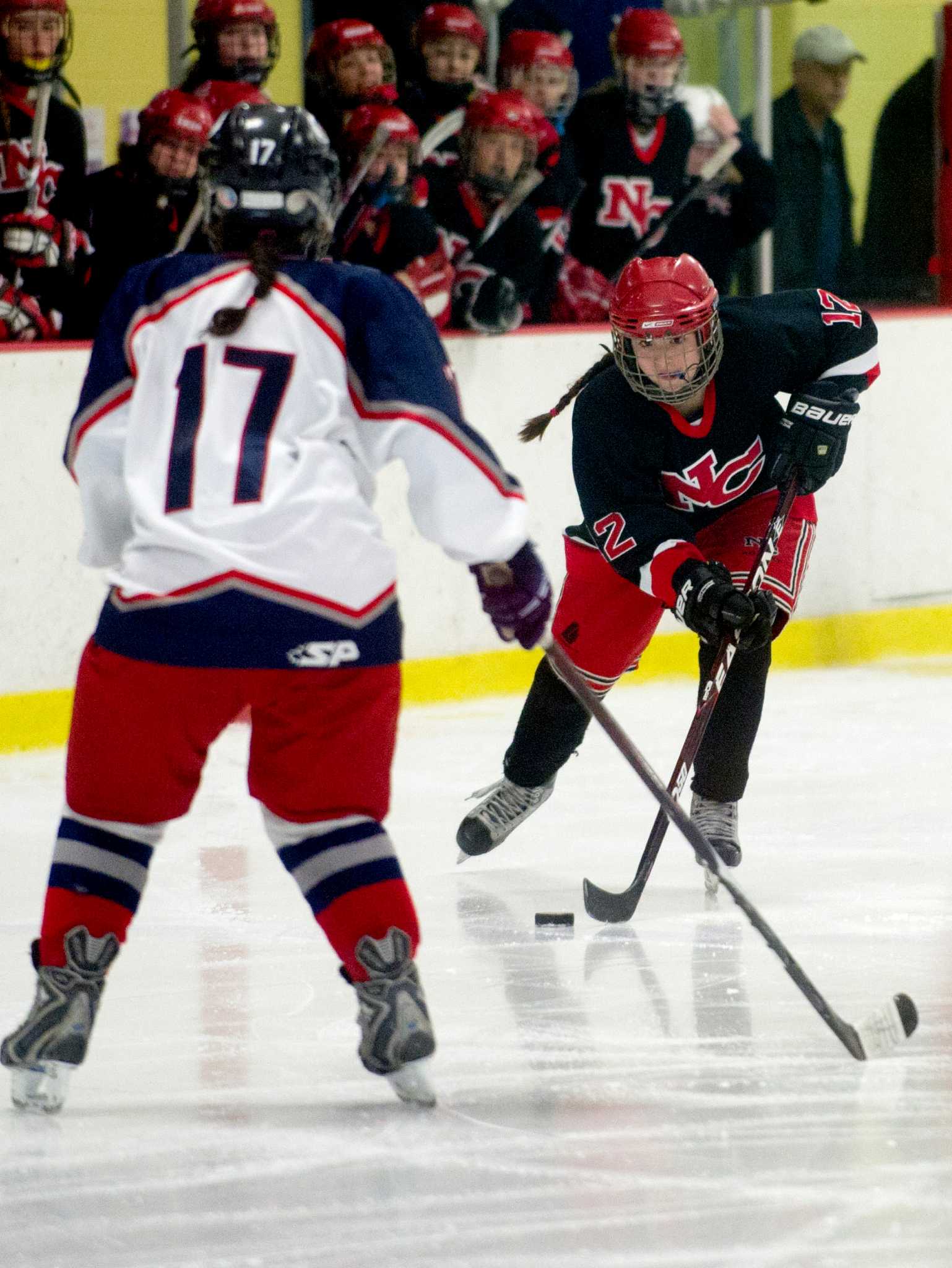 New Canaan girls hockey team enters season with state championship to