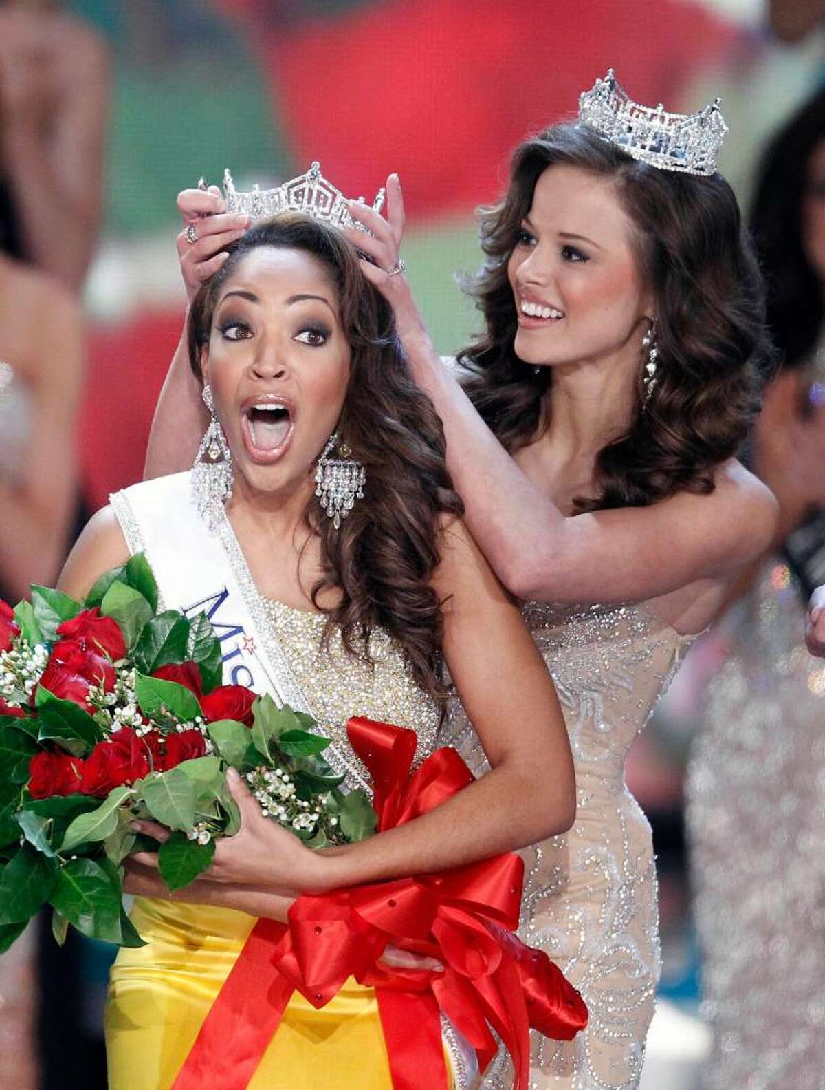 ** ALTERNATE CROP ** Miss Virginia Caressa Cameron reacts after being crowned Miss America by Miss America 2009 Katie Stam, Saturday Jan. 30, 2010 in Las Vegas. (AP Photo/Eric Jamison)