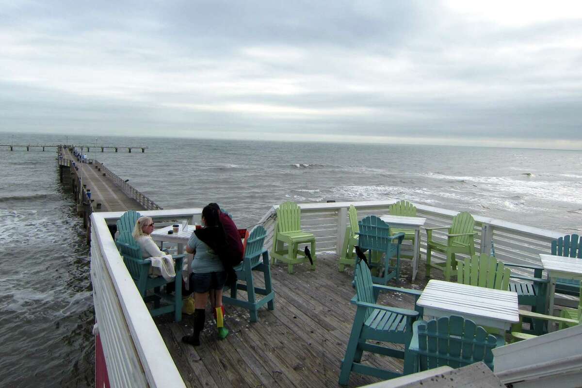 Jimmy's on the Pier on Galveston Island is a casual spot with colorful Adirondack seating that offers dreamy views of the Gulf.