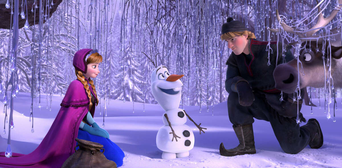 Anna, voiced by Kristen Bell; Olaf the snowman, voiced by Josh Gad; and Kristoff, voiced by Jonathan Groff in “Frozen.”