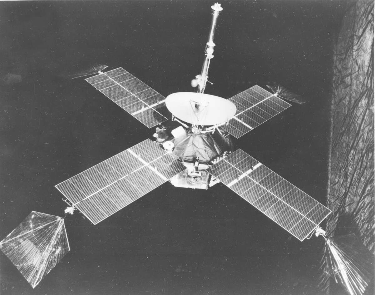 This is a view of Mariner 4 in flight attitude on July 13, 1965. The 575-pound spacecraft climaxedan historic 228-day, 325-million-mile voyage to Mars the next day by capturing the first close-up photographs of another planet. (AP Photo/NASA).