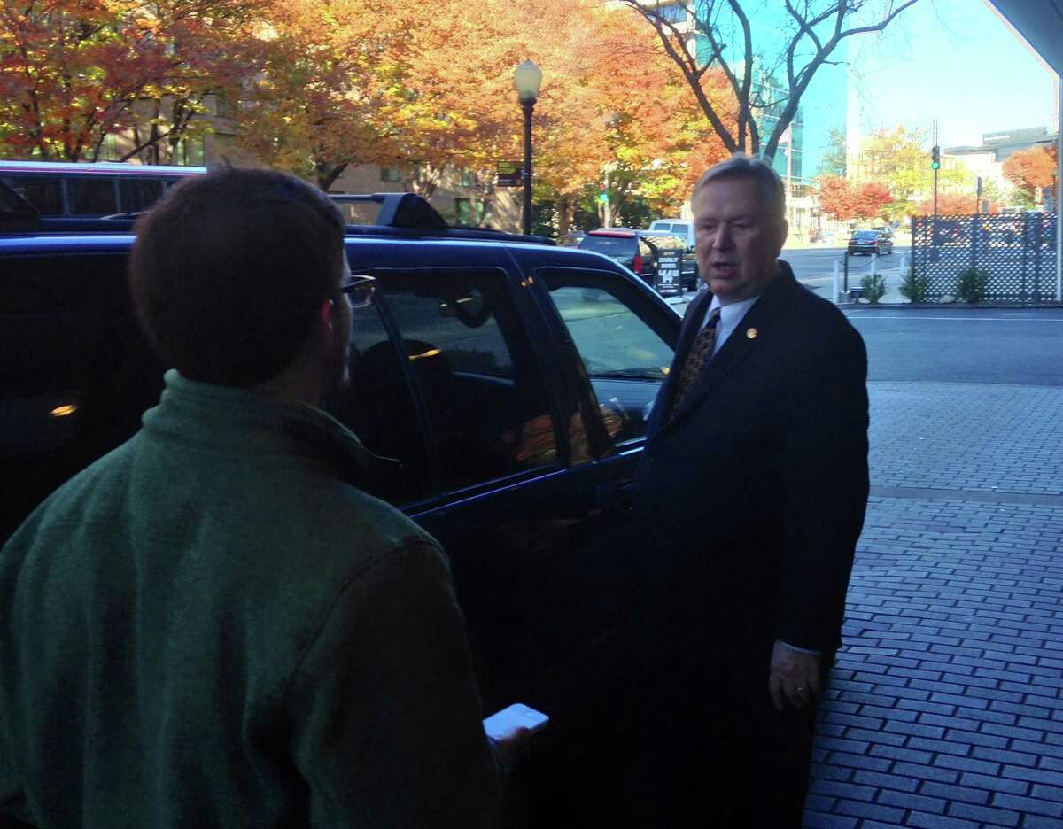 Rep. Steve Stockman talks with a reporter after a Washington, D.C. fundraiser for his campaign Nov. 13, 2013.