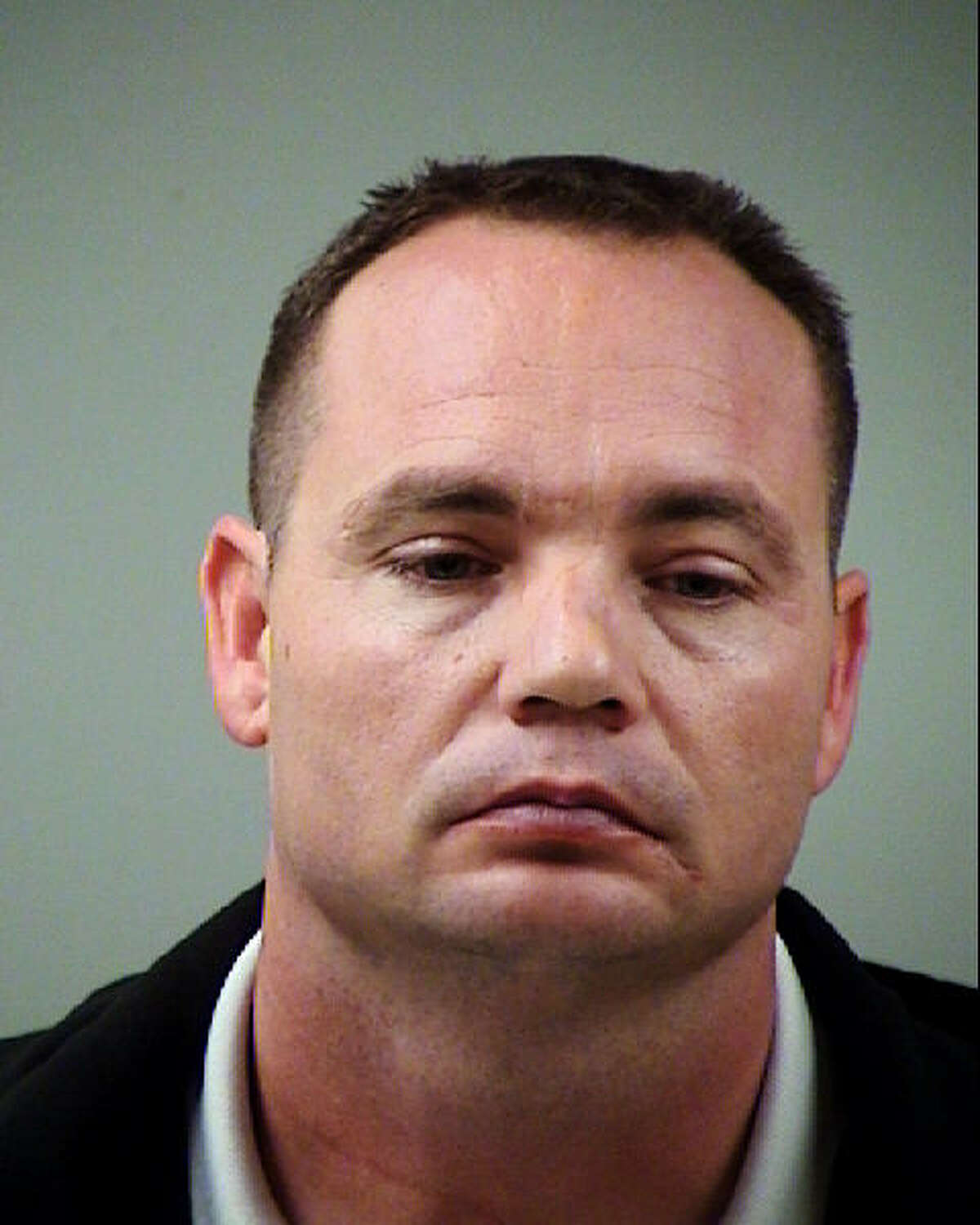 Policeman Jackie Len Neal is accused of raping a young woman in his patrol car.
