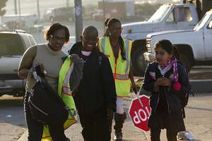 Walking 'school bus' helps put kids on course