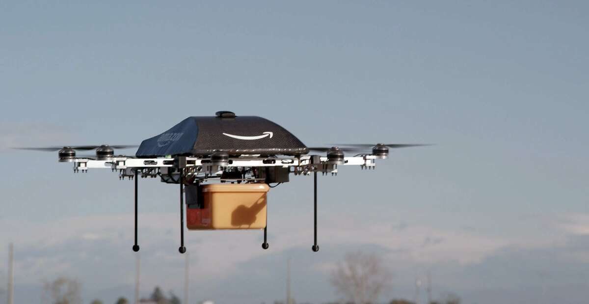 Amazon tests drone delivery This undated image shows the so-called Prime Air unmanned aircraft project that Amazon is working on in its research and development labs. Amazon says it will take years to advance the technology and for the Federal Aviation Administration to create the necessary rules and regulations, but CEO Jeff Bezos said Sunday Dec. 1, 2013, there's no reason Drones can't help get goods to customers in 30 minutes or less.Click here to read more