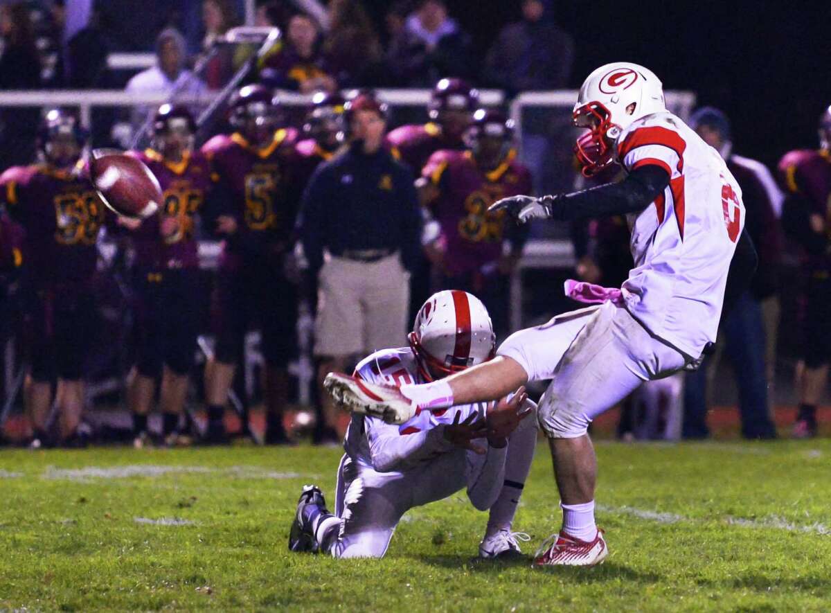 Guilderland's #8 Andrew Sentz's final second field goal is good for the win in their Class AA quarterfinal football game against Colonie Friday Oct. 24, 2013, in Colonie, NY. (John Carl D'Annibale / Times Union)