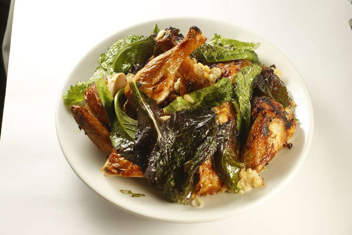 One of Zuni's most beloved dishes, the Zuni Roast Chicken With Bread Salad.