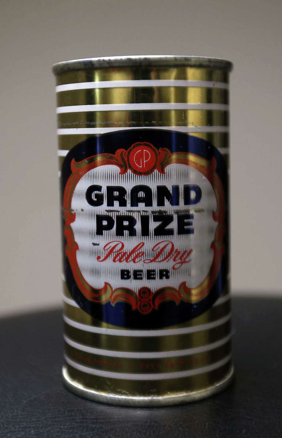 A can of Grand Prize beer which is part of Ken Knisely's beer can and beer memorabilia collection Wednesday, Nov. 27, 2013, in Houston. ( James Nielsen / Houston Chronicle )