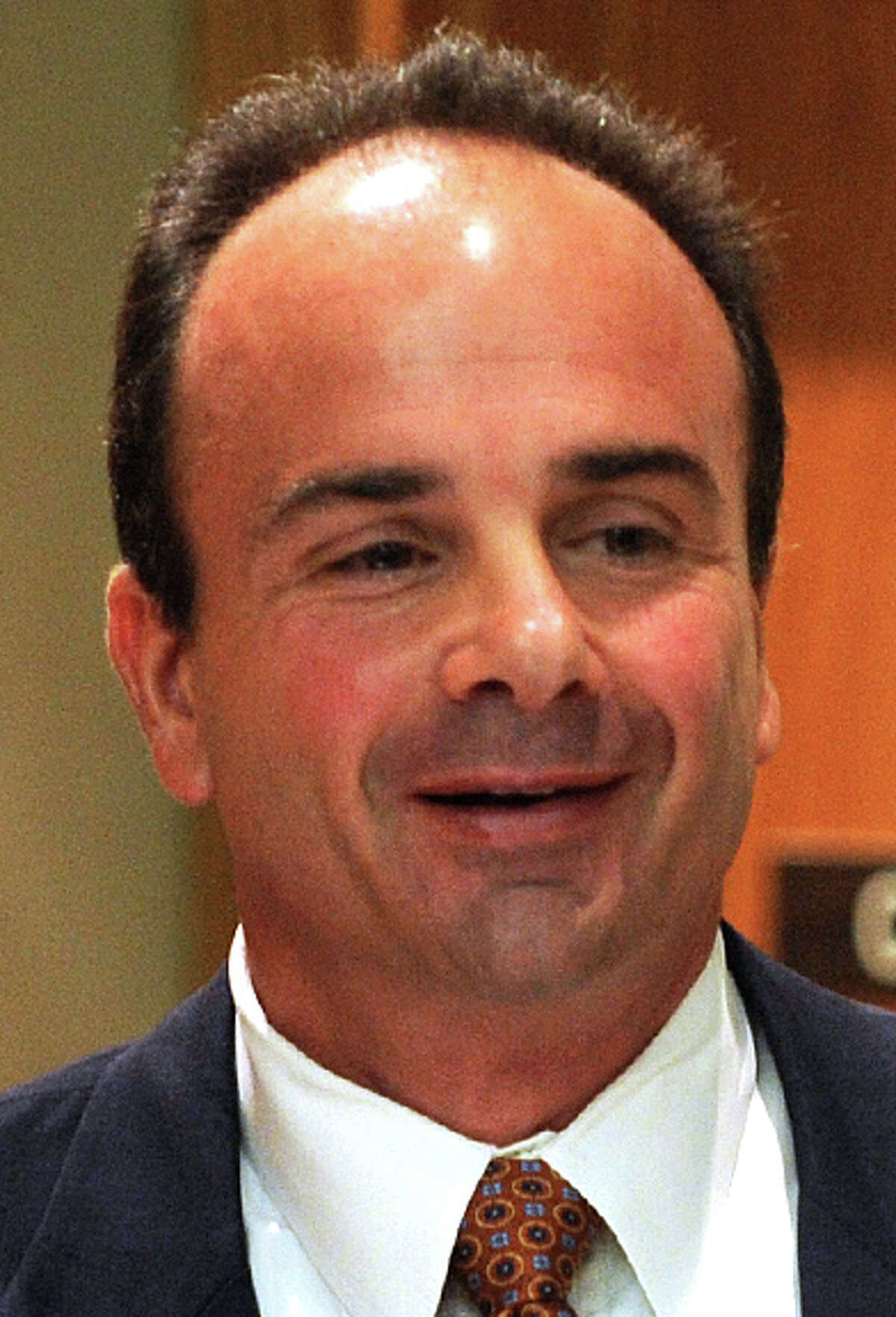 Former Bridgeport Mayor Joseph Ganim, center, and his attorneys Harold Rosnick, left, and George Ganim, right, in Bridgeport, Conn. Sept. 11th, 2012. Ganim appeared in front of a three judge panel Tuesday in his effort to regain his law license.