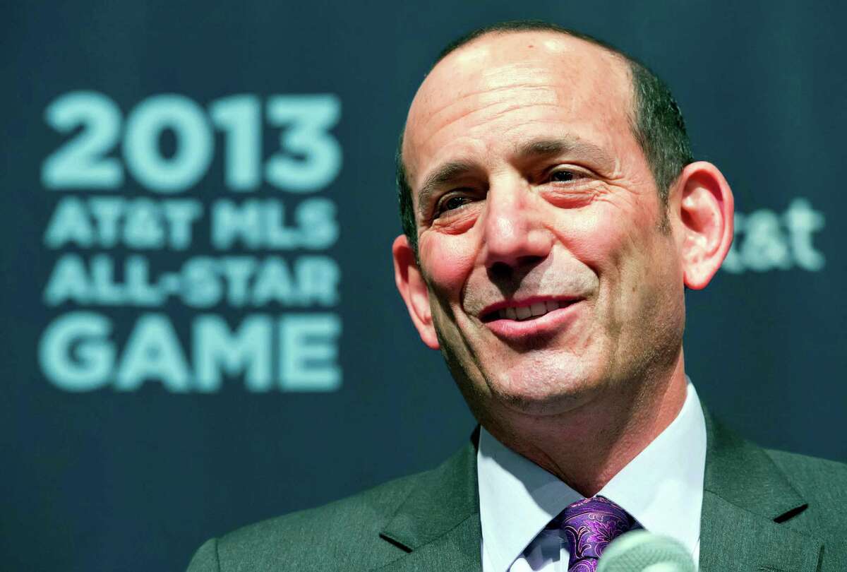 File- This Jan. 10, 2013 file photo shows Major League Soccer commissioner Don Garber addressing the media during a news conference in Kansas City, Kan. (AP Photo/The Kansas City Star, David Eulitt)