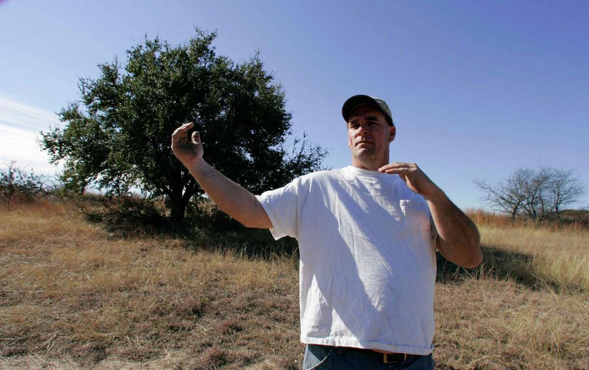 **RETRANSMITTING TO CORRECT YEAR** Standing near the area where he saw a large silent object in the sky, Ricky Sorrells talks about the sighting, Monday, Jan.14, 2008 in Dublin, Texas.